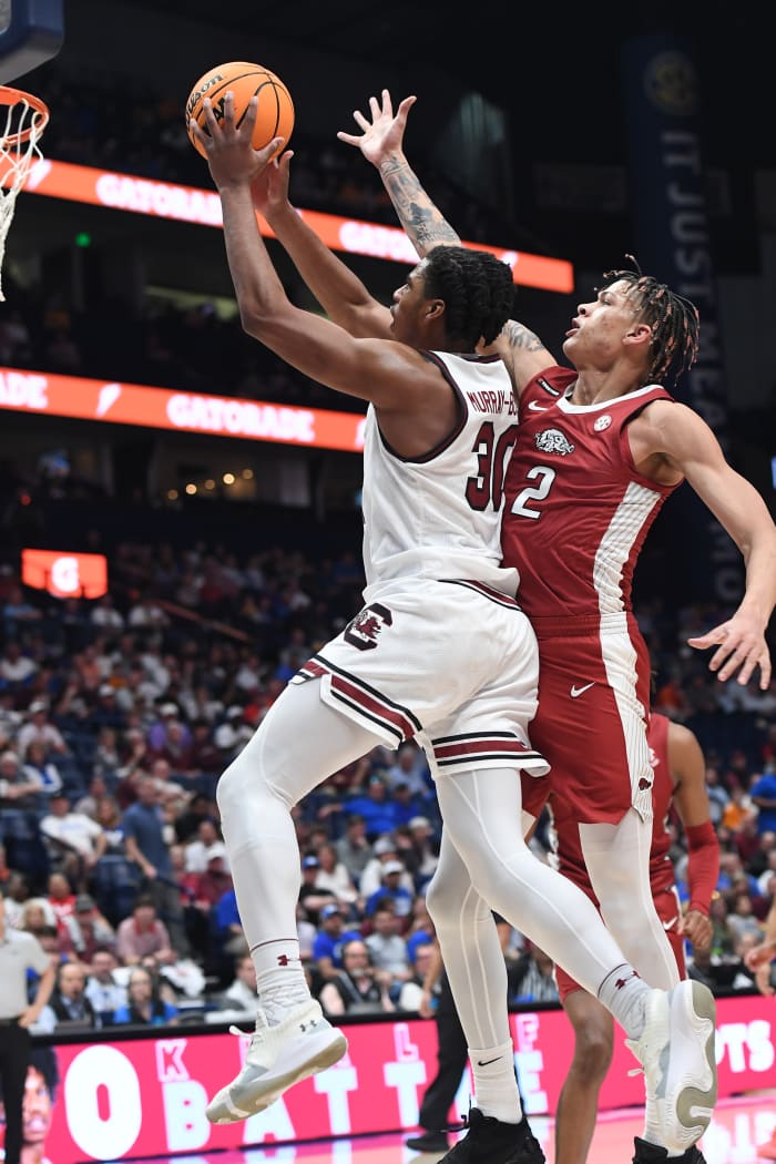 Murray-Boyles goes past Brazile trying to attack the basket in the first half versus Arkansas (14th Mar., 2024)